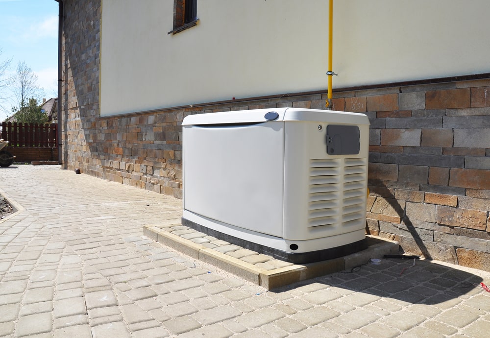 Big Backup Natural Gas Generator for House Building Outdoor. Generator installed by an electrician